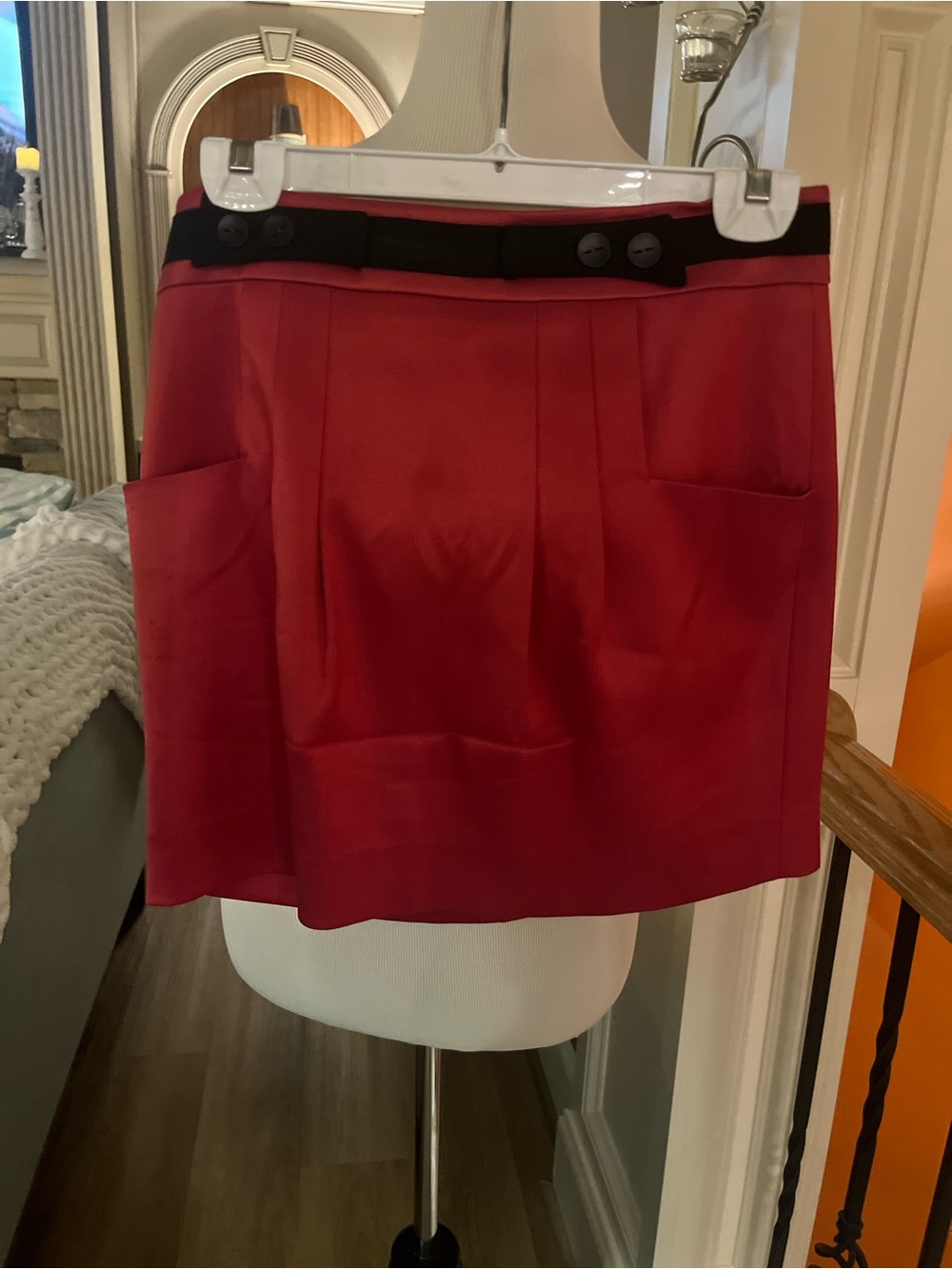 Mayle Coral-Red Mini Skirt with Black Trim